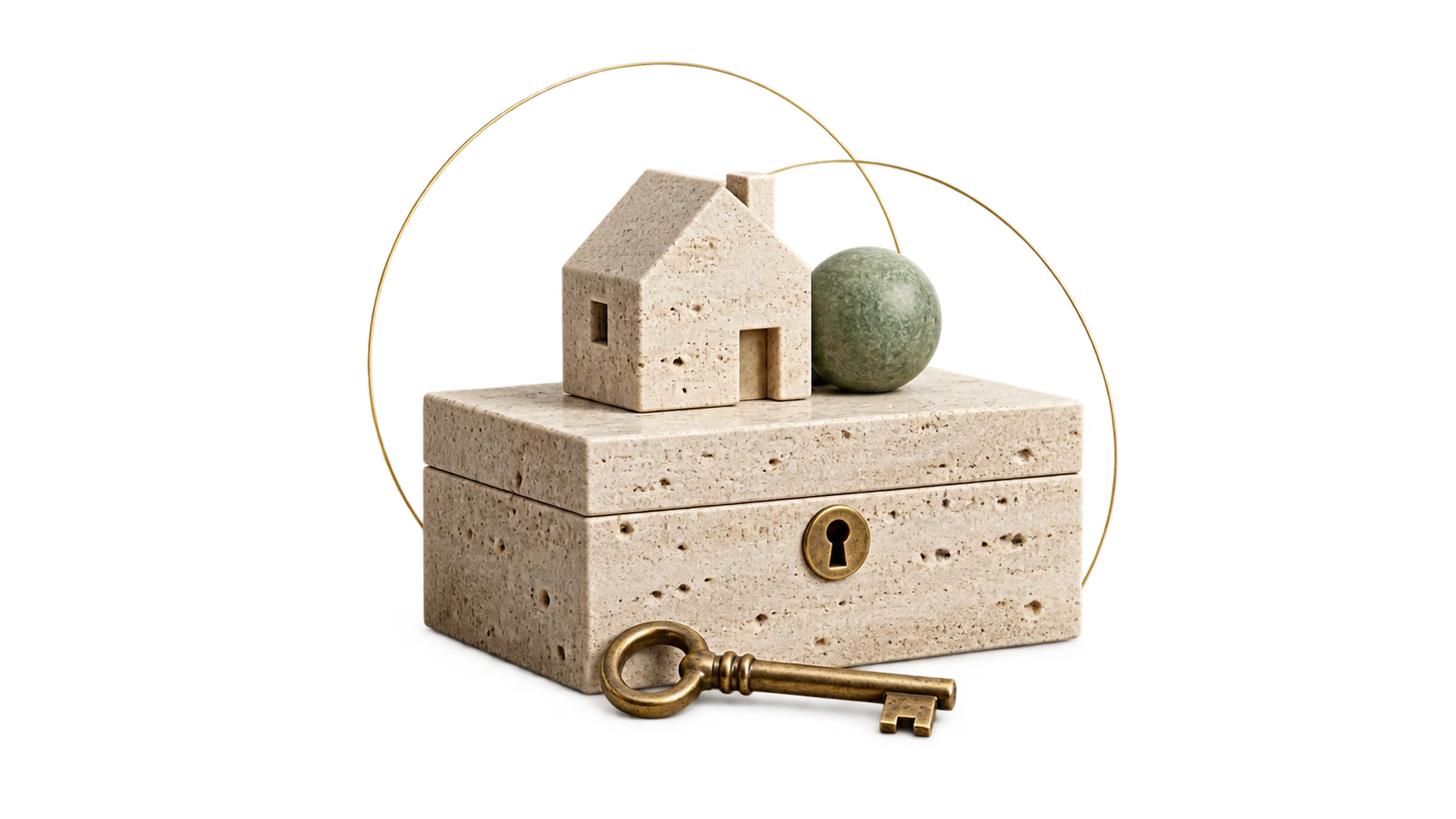 A travertine vault box with a brass key and a small stone house resting on top